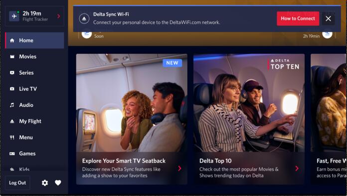 A seatback screen shows a notification informing passengers that fast, free Wi-Fi is available for their personal devices.&nbsp;