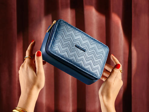 Delta and Missoni – a brand known for its creative use of colors and patterns – have elevated Delta One with a new customer amenity kit, which features Missoni's signature textured zigzag pattern on the exterior of the bag. 