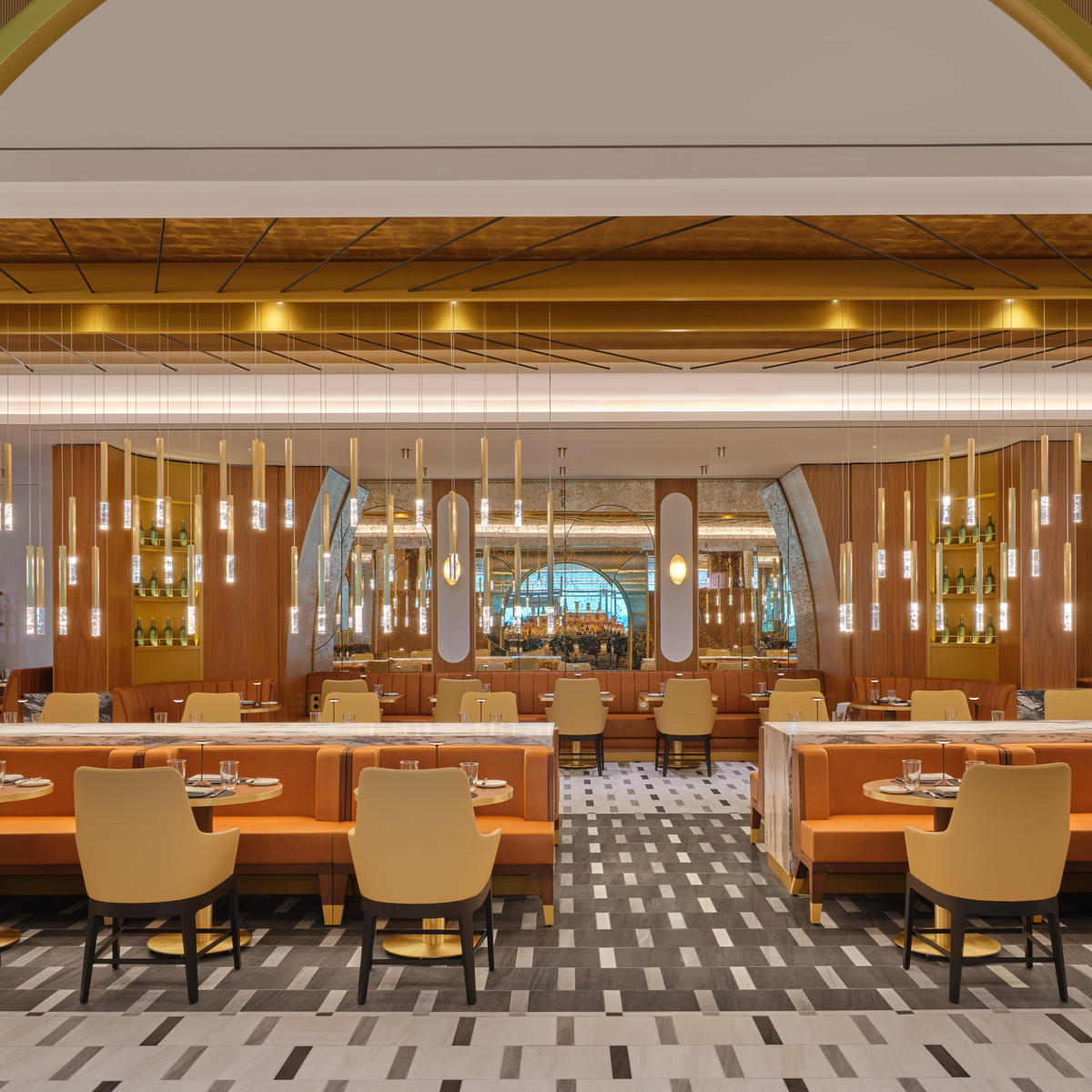 The iconic overlapping strands of the Brooklyn Bridge provided inspiration for the suspended lighting fixture in the dining room at The Delta Lounge-JFK.
