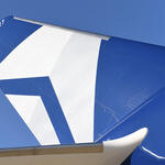The tail of Delta's Centennial livery, which features the airline's Centennial colors: blue and silver.