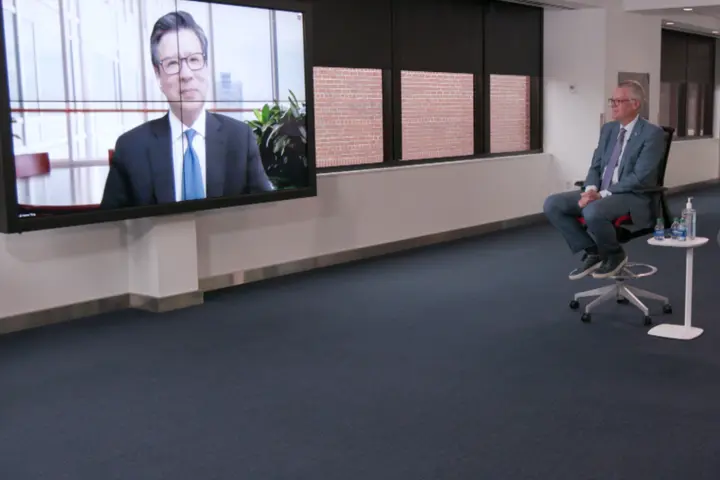 Delta CEO Ed Bastian conferencing with Chief Health Officer Dr. Henry Ting