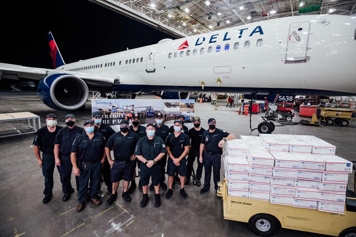 TechOps employee and veteran ships out 7,000th care package to military 