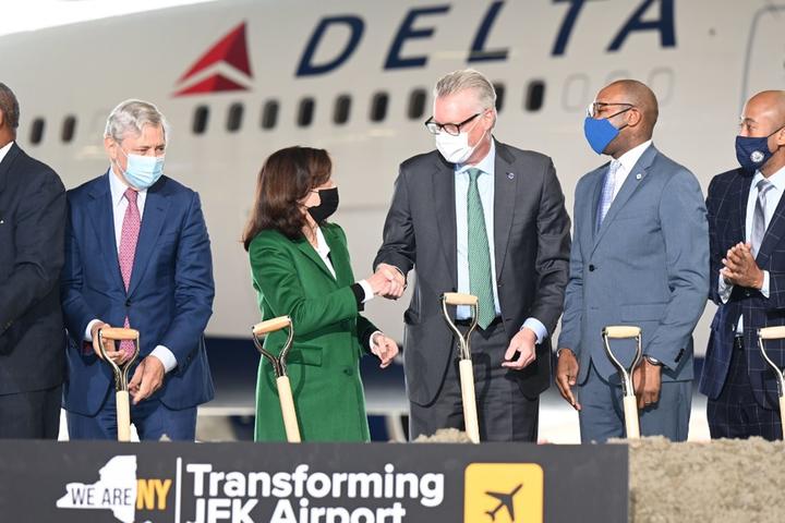 Ed Bastian joins New York officials at JFK.