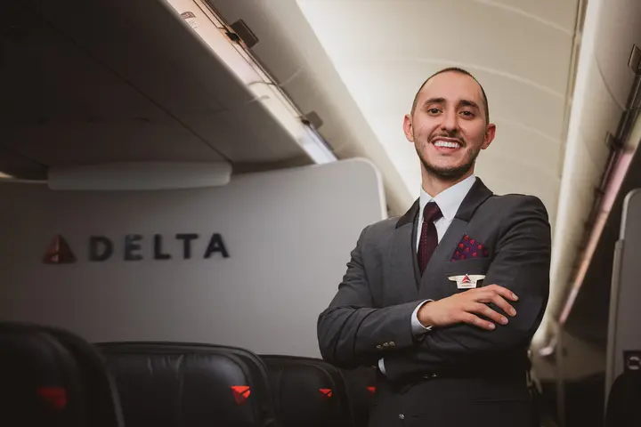 Delta flight attendant onboard an aircraft