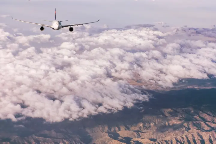 A330-300 flying through clouds