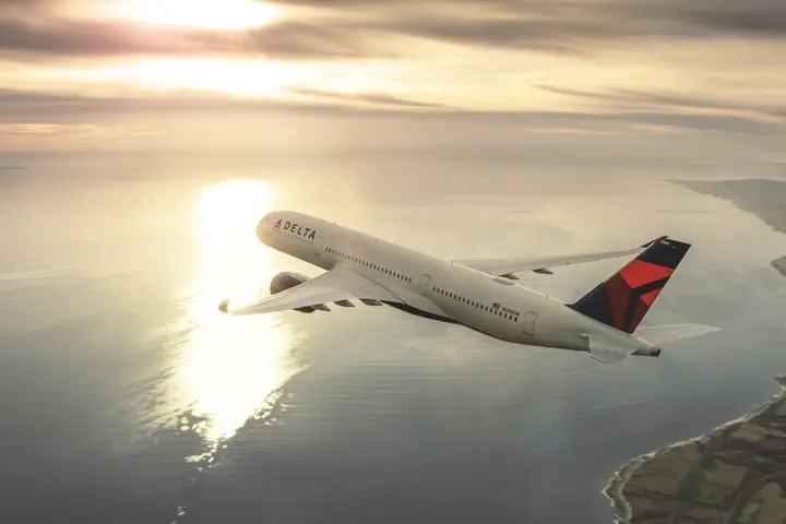 A350-900 in flight over water