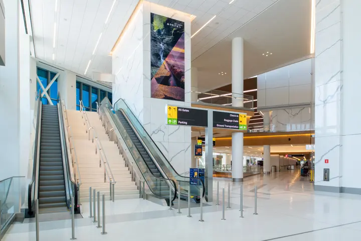 Grand entrance to Delta’s new LaGuardia terminal -- view of escalators and stairs
