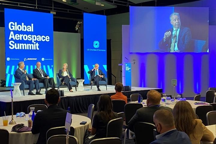 Capt. Patrick Burns speaks on a panel at the U.S. Chamber of Commerce Global Aerospace Summit in September 2022.