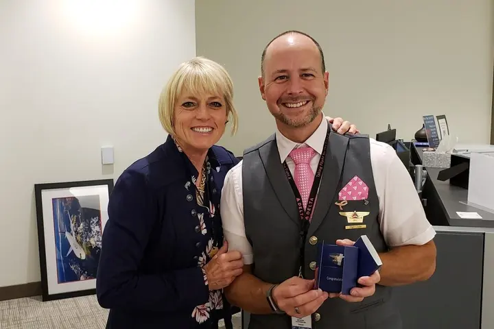 Eric Schoenbaum poses with a colleague.