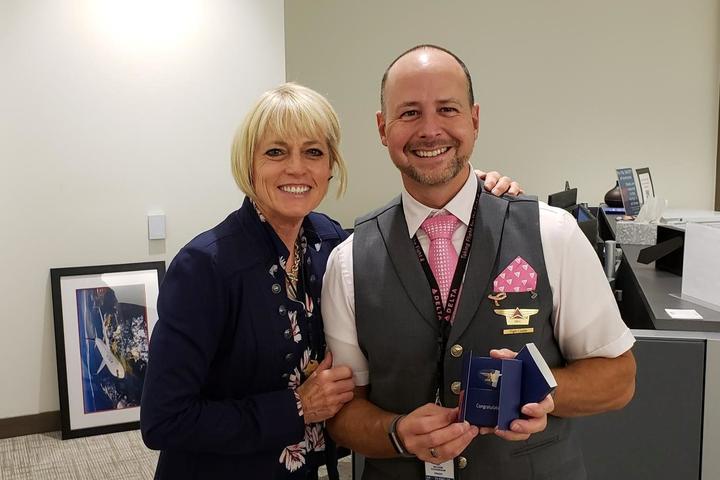 Eric Schoenbaum poses with a colleague.