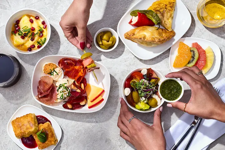 An array of Spanish tapas offered in Delta One as part of the pre-arrival menu selections.