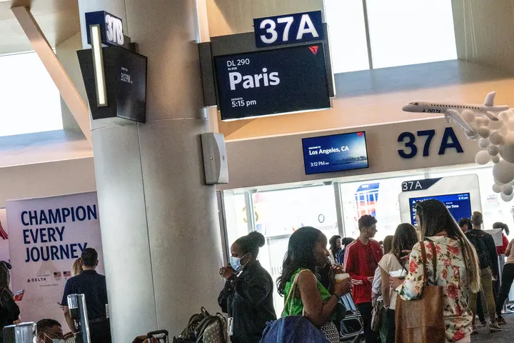 Delta people, customers and friends celebrate the departure of Delta Flight 290 from Los Angeles International Airport (LAX) to Paris Charles de Gaulle Airport (CDG).