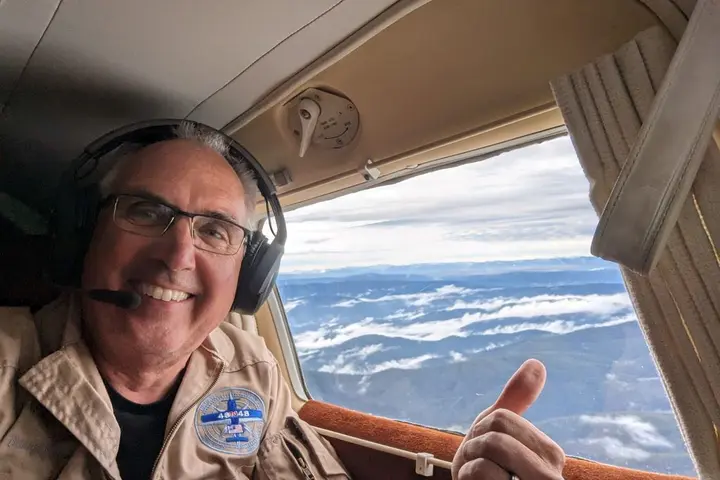 Delta pilot Barry Behnfeldt takes a selfie from the cockpit of his 1980 PA32R Piper Saratoga - the plane used to attempt the Guinness World Record of flying through 48 states in 48 hours.