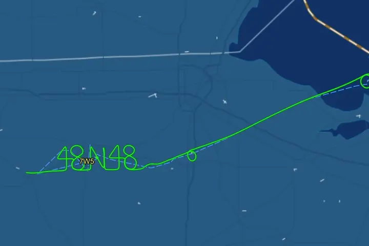 Delta pilots Barry Behnfeldt and Aaron Wilson spell out 48N48 in the sky while flying back home after flying through 48 states in 48 hours.