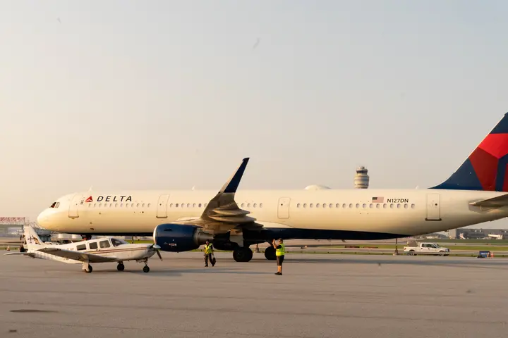 Pilots Barry Behnfeldt and Aaron Wilson, along with maintenance technician Thomas Twiddy make a stop at Hartsfield-Jackson Atlanta International Airport (ATL) during their 48N48 mission -- an attempt to land in all 48 of the contiguous states within 48 hours. They were greeted by Delta Chief of Operations John Laughter.