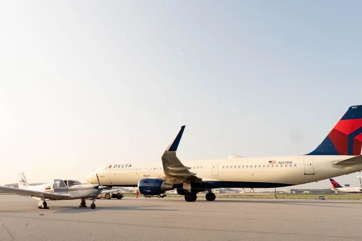 Pilots Barry Behnfeldt and Aaron Wilson, along with maintenance technician Thomas Twiddy make a stop at Hartsfield-Jackson Atlanta International Airport (ATL) during their 48N48 mission -- an attempt to land in all 48 of the contiguous states within 48 hours. They were greeted by Delta Chief of Operations John Laughter.