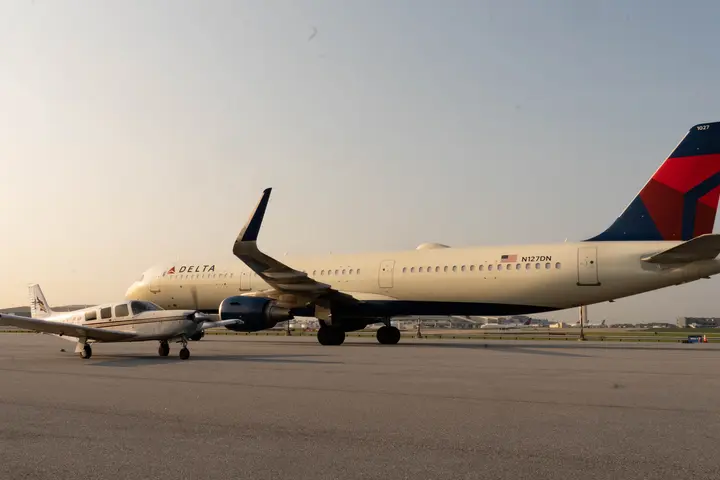 Pilots Barry Behnfeldt and Aaron Wilson, along with maintenance technician Thomas Twiddy make a stop at Hartsfield-Jackson Atlanta International Airport (ATL) during their 48N48 mission -- an attempt to land in all 48 of the contiguous states within 48 hours. They were greeted by Delta Chief of Operations John Laughter.