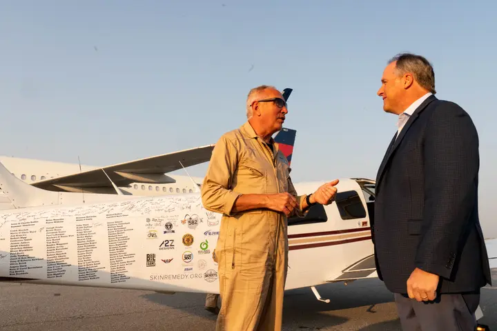 Pilots Barry Behnfeldt and Aaron Wilson, along with maintenance technician Thomas Twiddy make a stop at Hartsfield-Jackson Atlanta International Airport (ATL) during their 48N48 mission -- an attempt to land in all 48 of the contiguous states within 48 hours. They were greeted by Delta Chief of Operations John Laughter.