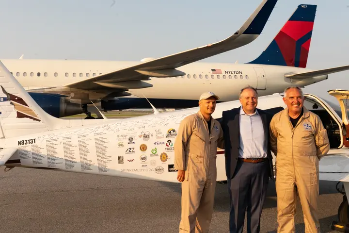 Pilots Barry Behnfeldt and Aaron Wilson, along with maintenance technician Thomas Twiddy make a stop at Hartsfield-Jackson Atlanta International Airport (ATL) during their 48N48 mission -- an attempt to land in all 48 of the contiguous states within 48 hours. They were greeted by Delta Chief of Operations John Laughter.