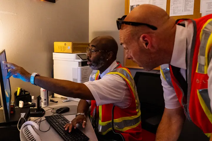Delta Elite Services Ambassadors Anthony Grant (left) and Dan Lavker (right) plan to surprise and delight customers with Porsche transfers to connecting flights.