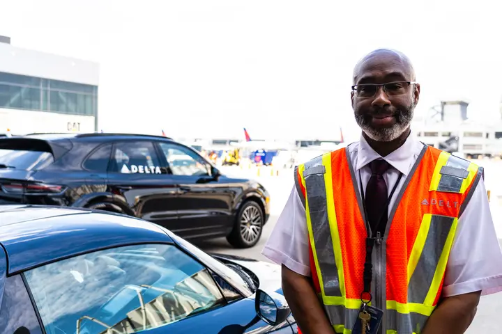 Delta Elite Services Agent Anthony Grant prepares to escort connecting customers at Hartsfield-Jackson Atlanta International Airport.