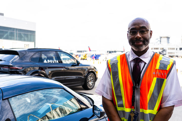 Delta Elite Services Agent Anthony Grant prepares to escort connecting customers at Hartsfield-Jackson Atlanta International Airport.