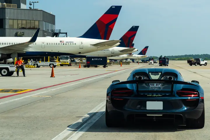 A Porsche 918 Spyder carries a Delta customer to a connecting flight at Hartsfield-Jackson Atlanta International Airport.