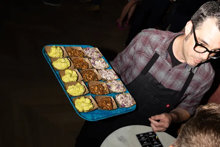 At Delta's reservation only speakeasy for Medallion members at SXSW, members got to enjoy truly exclusive experiences, like an evening BBQ tasting experience from world-renowned Austin pit master Aaron Franklin of Franklin BBQ.