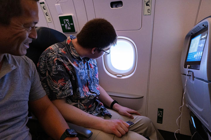 Customers on board DL 1010 from Dallas Fort Worth International Airport (DTW) to Detroit Wayne County Metropolitan Airport (DFW) view the solar eclipse.