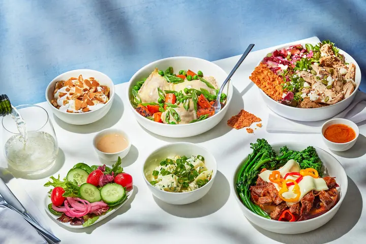 A flatlay of food available to Delta First Class customers departing from Atlanta, available beginning June 2024.