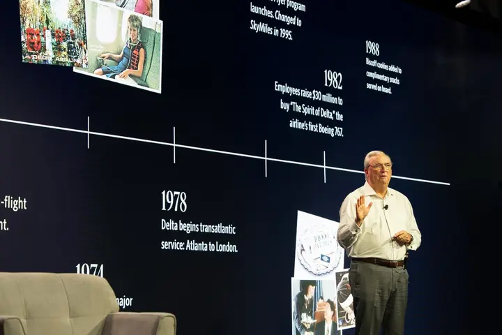 Man giving presentation on stage