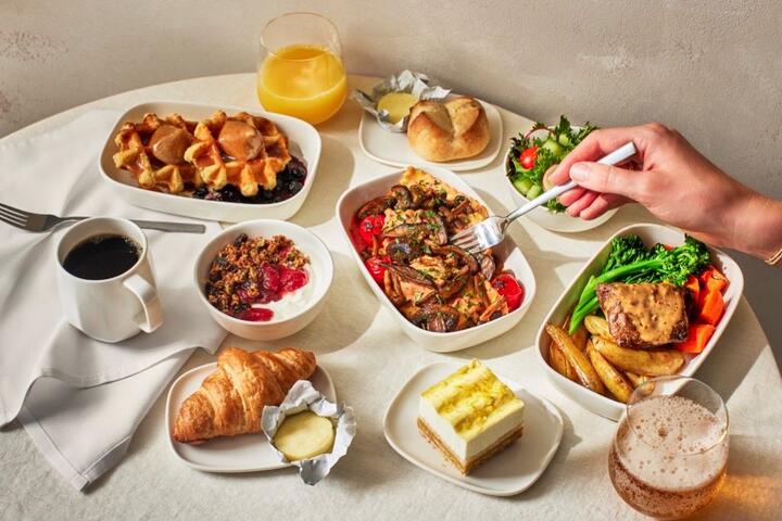 A spread of food featured on Delta flights for Delta One and Premium Select customers