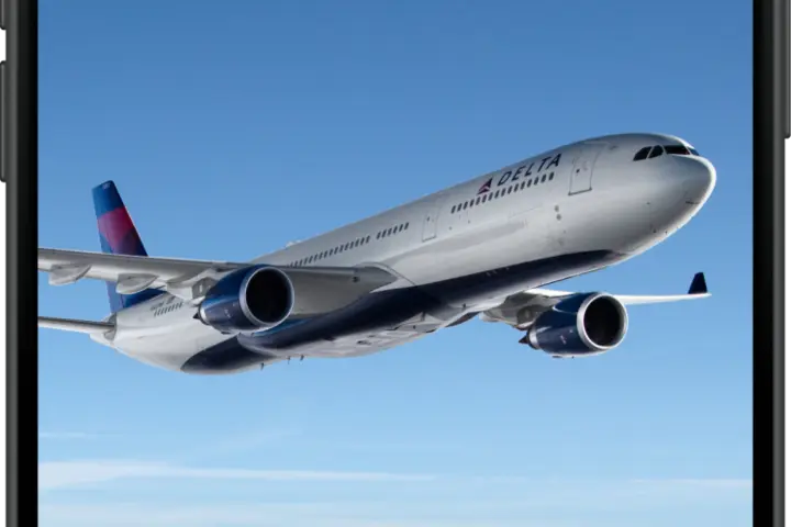 Smartphone lock screen showing a Delta airplane in flight with a notification reading “DL218 Now Boarding,” marked “On Time,” and the time displayed as 4:00 on Sunday, June 7.