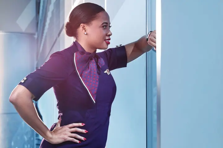 A Delta flight attendant is pictured.