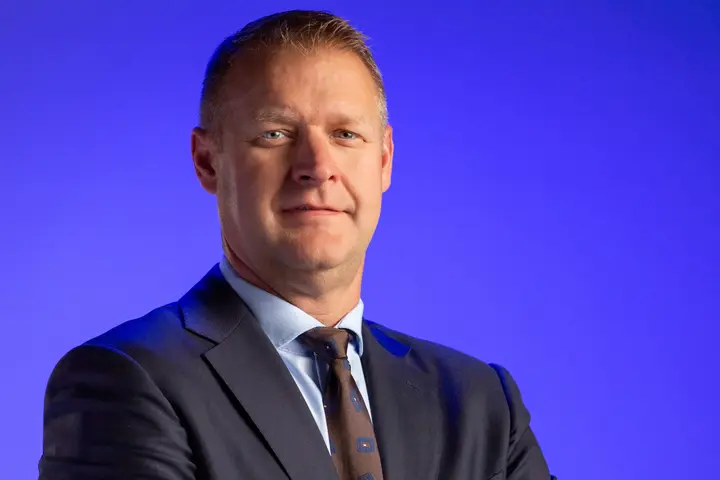 A headshot of Ryan Gumm, S.V.P. – Operations & Customer Center (OCC) and Ops Analytics
