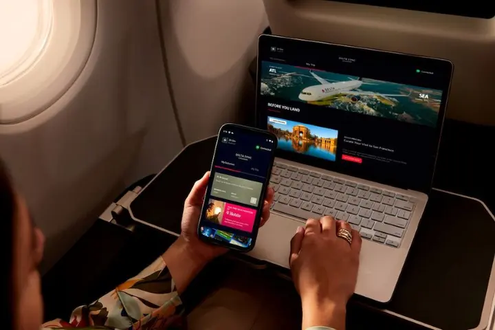 A Delta customer accesses Delta Sync using Delta's free Wi-Fi.