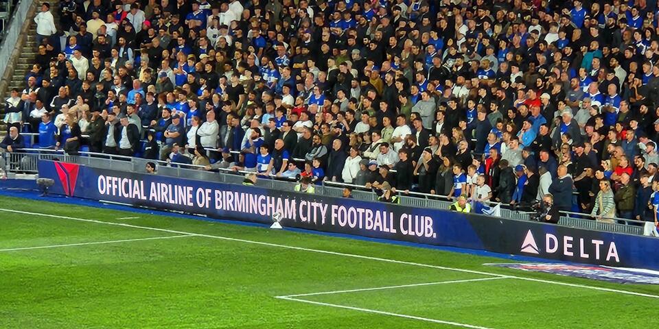 Delta branding can be seen on the sidelines during a Birmingham City Football Club game.