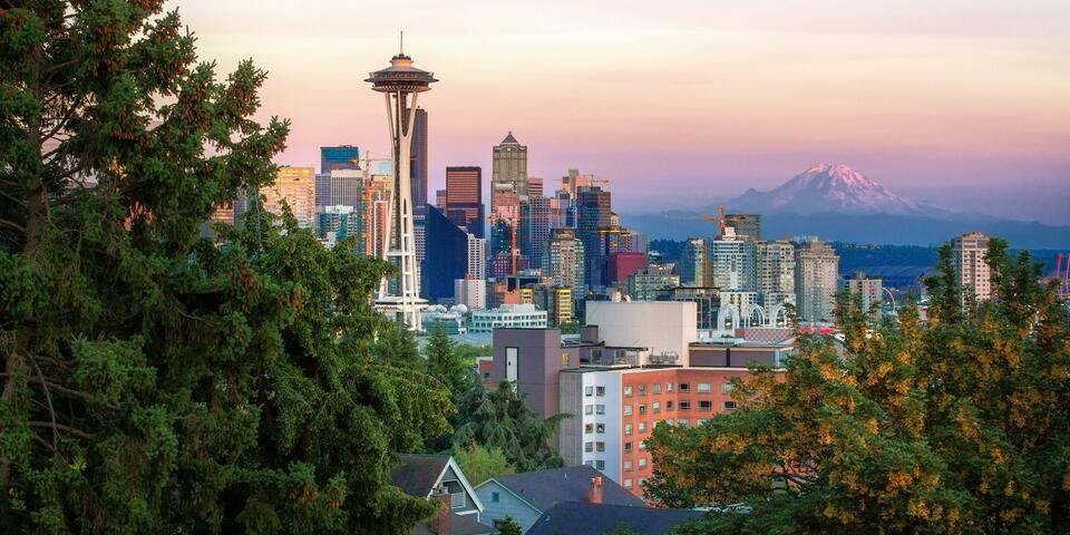 A view of the Seattle skyline featuring the Space Needle and Mt. Rainier