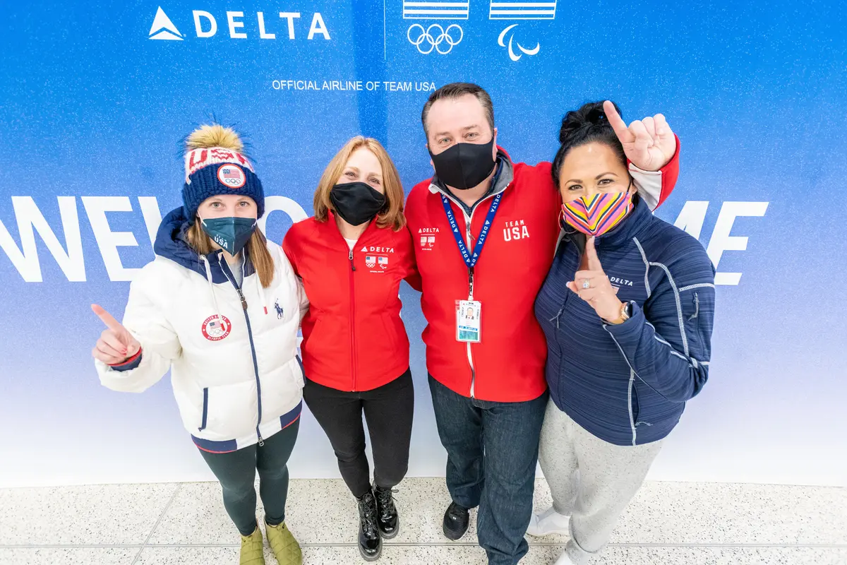 (From left to right) Nikki Leonard, fiancee of speedskater Ryan Pivorotto, Kris, a Delta Air Lines flight attendant and Nikki's mother, Scott, a Delta Air Lines First Officer and uncle of pairs figureskater Brandon Frazier, and Heather, wife of Scott