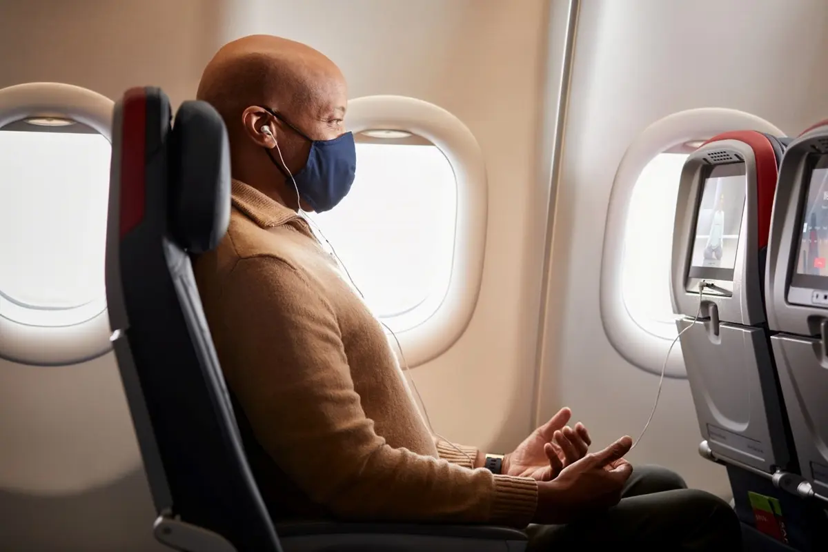 A customer enjoys some of Delta's in-flight wellness offerings.