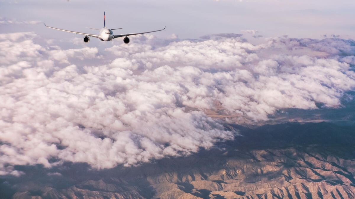 A330-300 flying through clouds