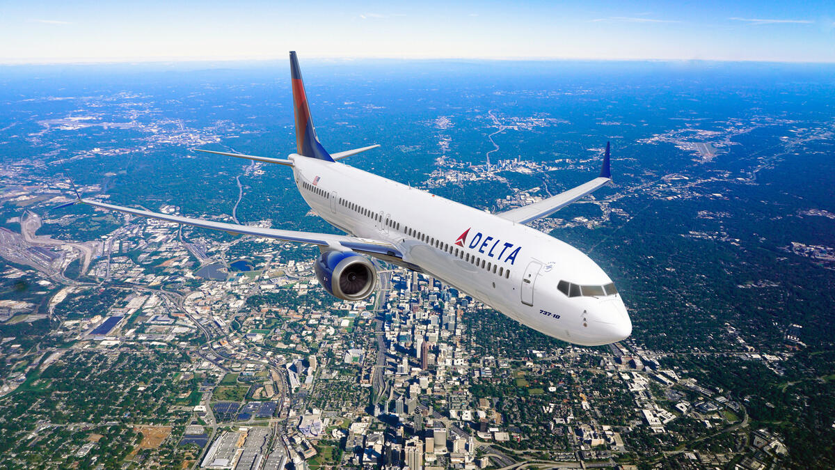 Boeing 737-10 in flight over Atlanta