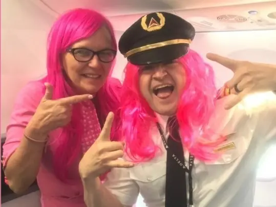 Flight attendant Robin Schmidt is pictured with one of her Delta colleagues.
