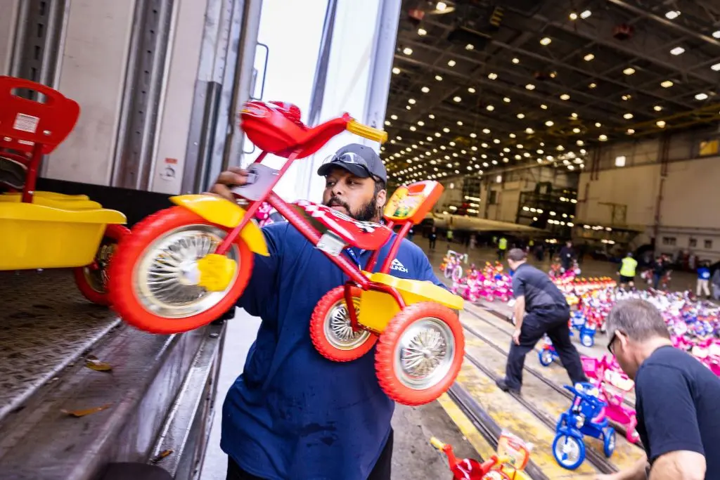 Delta people from TechOps, In-Flight Service, Global Sales, Finance, IT and Flight Operations rallied to purchase and assemble bicycles, as well as rally toy and money donations to support Toys for Tots.
