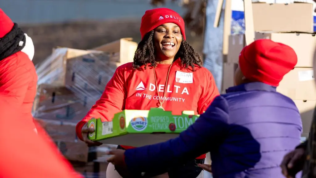 A Delta employee volunteers at Hosea Helps in Atlanta during the annual "Hosea Helps Festival of Services" event.