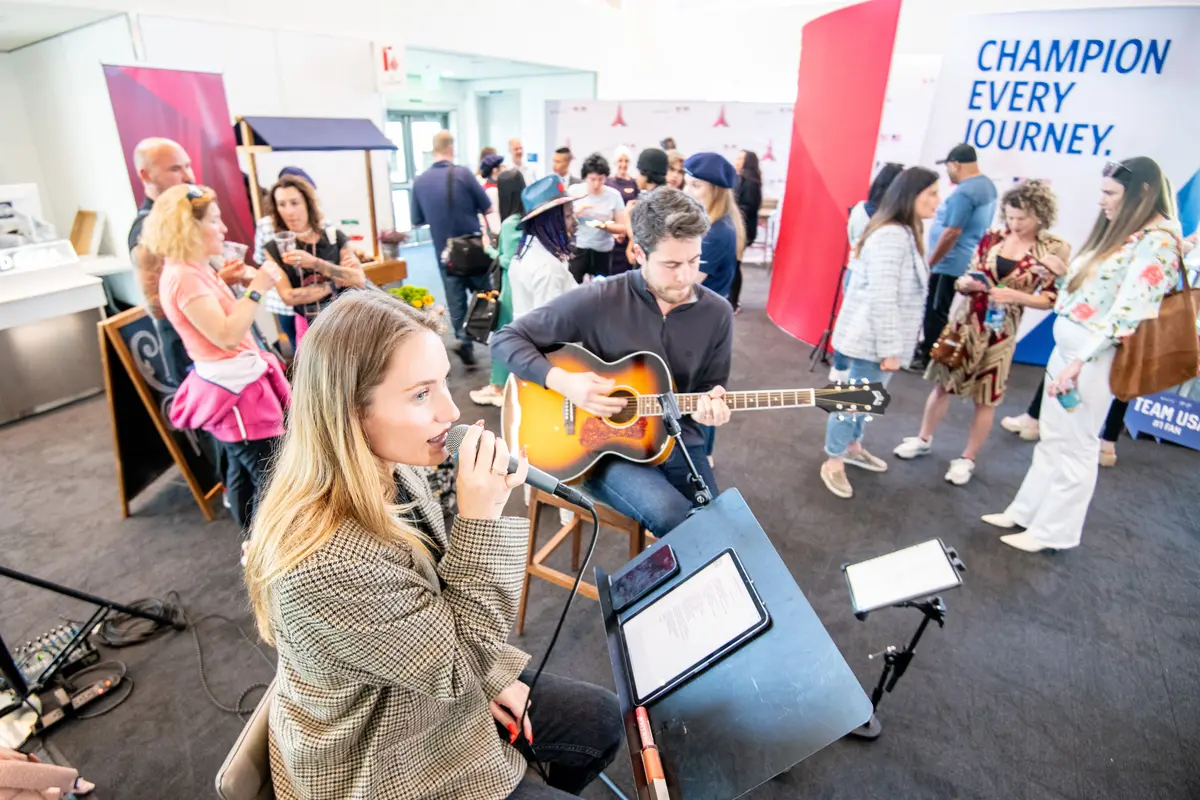 Delta people, customers and friends celebrate the departure of Delta Flight 290 from Los Angeles International Airport (LAX) to Paris Charles de Gaulle Airport (CDG).