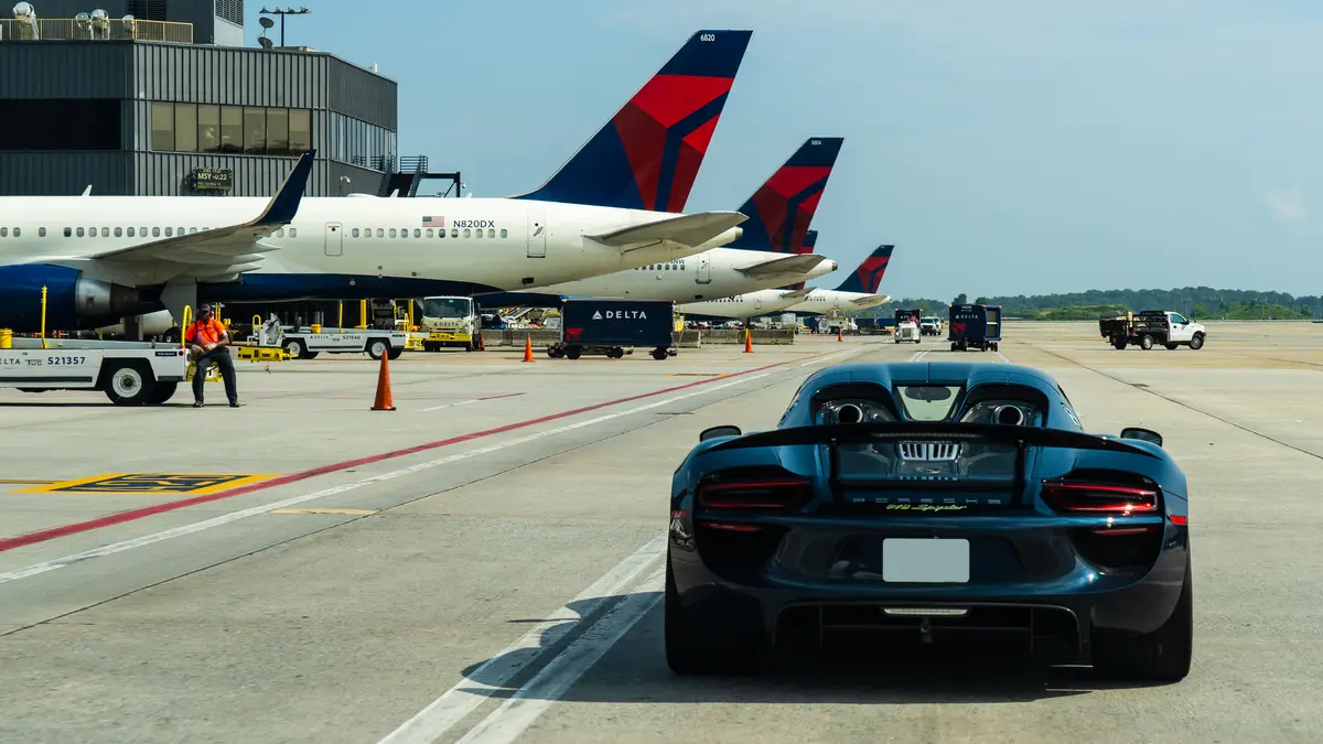 A Porsche 918 Spyder carries a Delta customer to a connecting flight at Hartsfield-Jackson Atlanta International Airport.