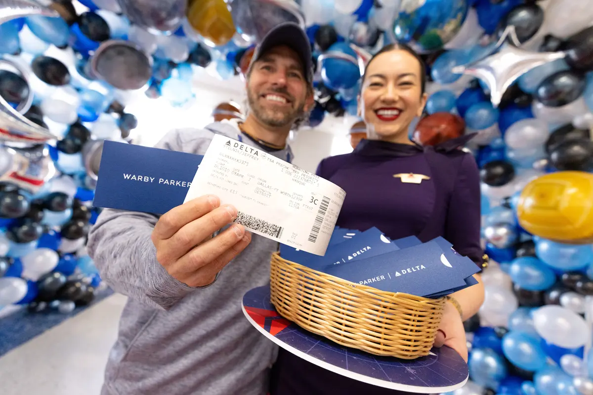 Delta people and customers enjoy the festivities in Dallas ahead of one of Delta's two eclipse flights on April 8, 2024.
