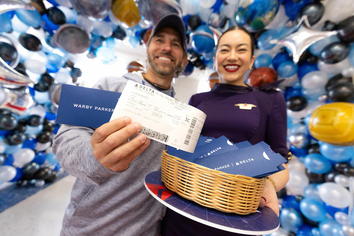 Delta people and customers enjoy the festivities in Dallas ahead of one of Delta's two eclipse flights on April 8, 2024.