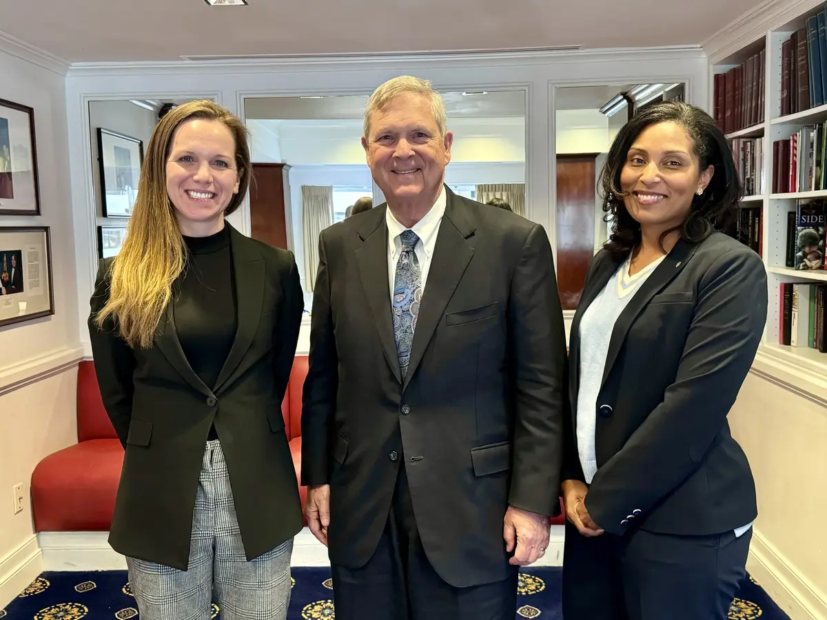 Delta Chief Sustainability Officer Amelia DeLuca and Cherie Wilson, V.P. Government Affairs – Sustainability with U.S. Department of Agriculture Secretary Tom Vilsack
